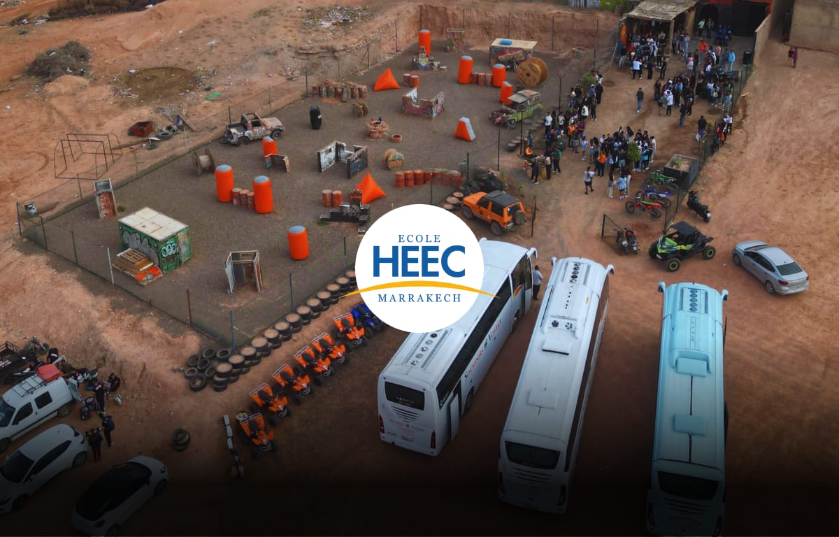 ALT Text: HEEC School students at Volcano Experience Marrakech wearing paintball gear and quad bike in the front