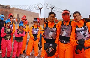 : Young HEEC students wearing paintball outfits